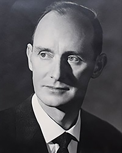 Black and white portrait of Dr. Host Liebich looking slightly to the side, seemingly in thought.